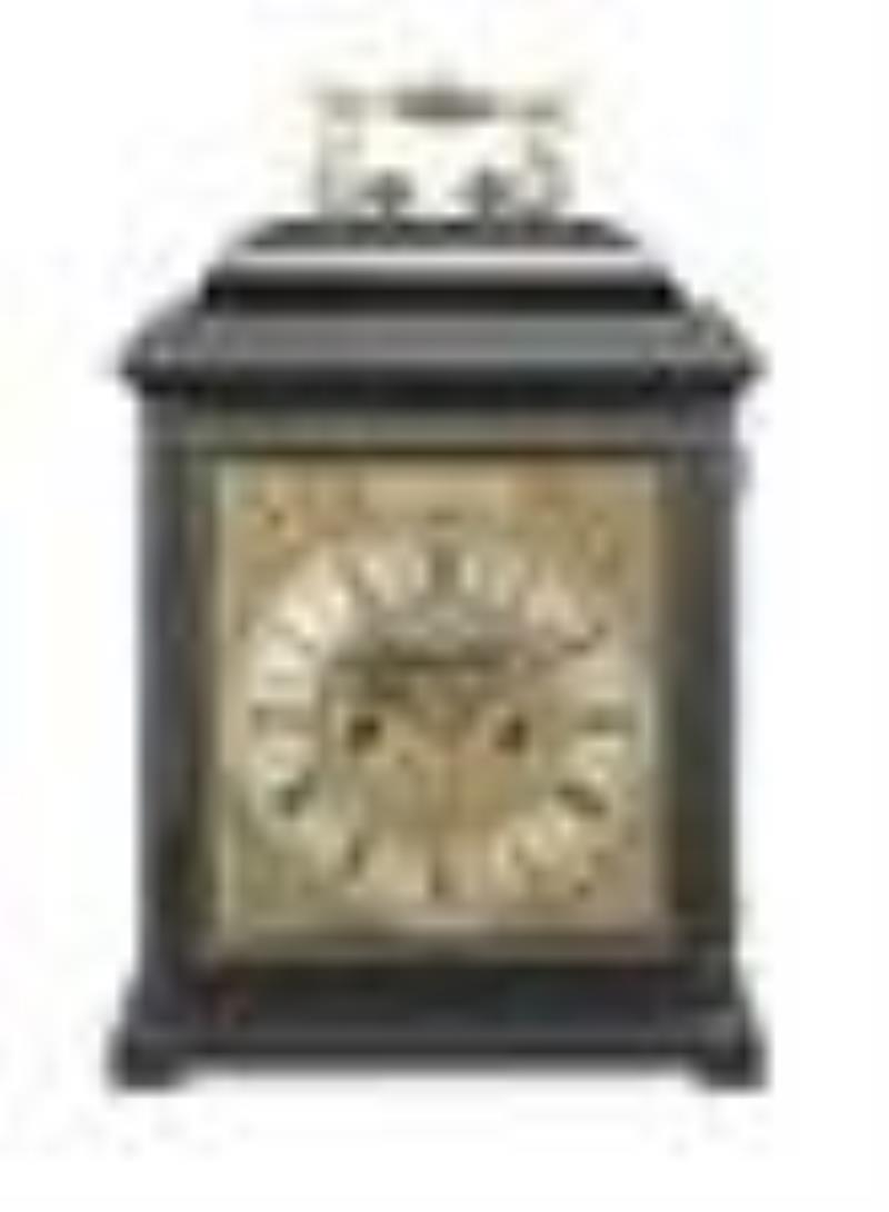 A rare early 18th century ebony table clock