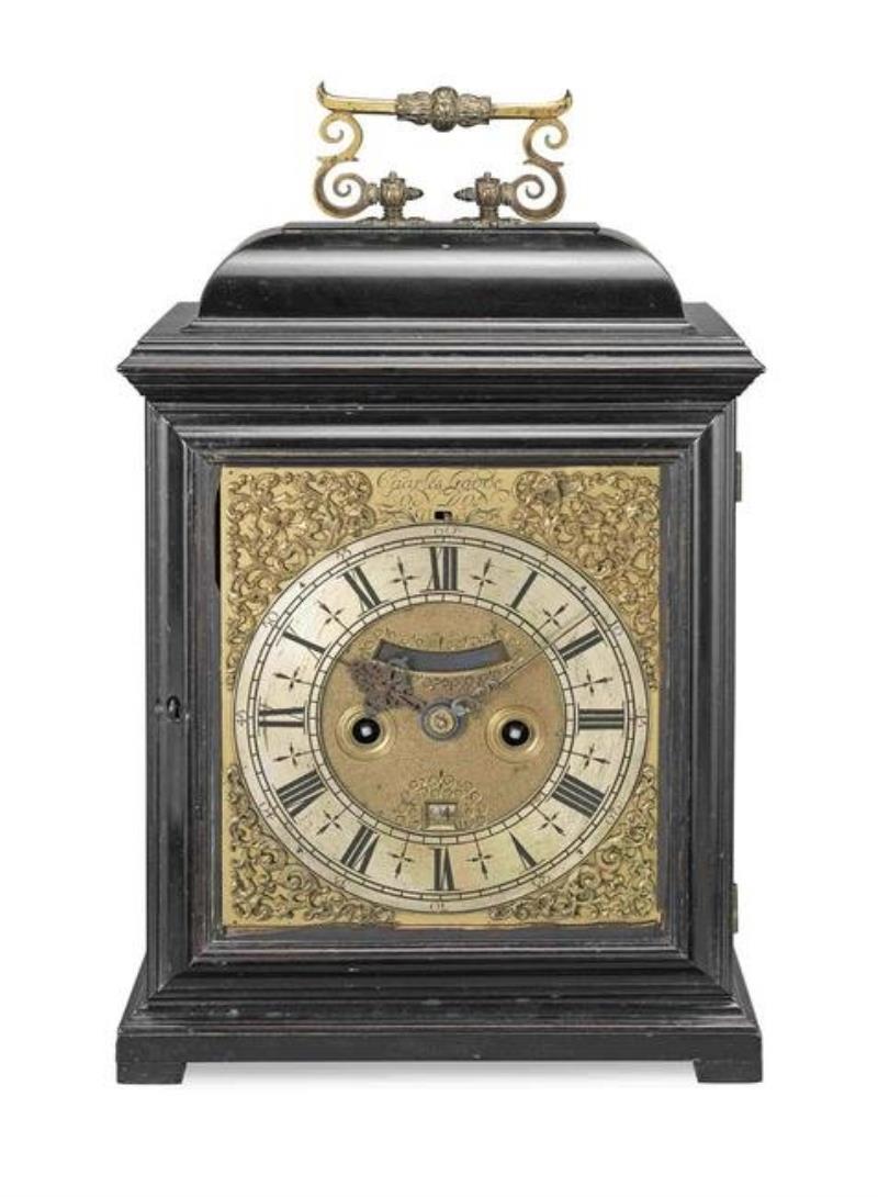 A rare early 18th century ebony table clock