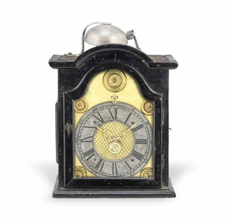 A 19th century European weight driven wall clock with