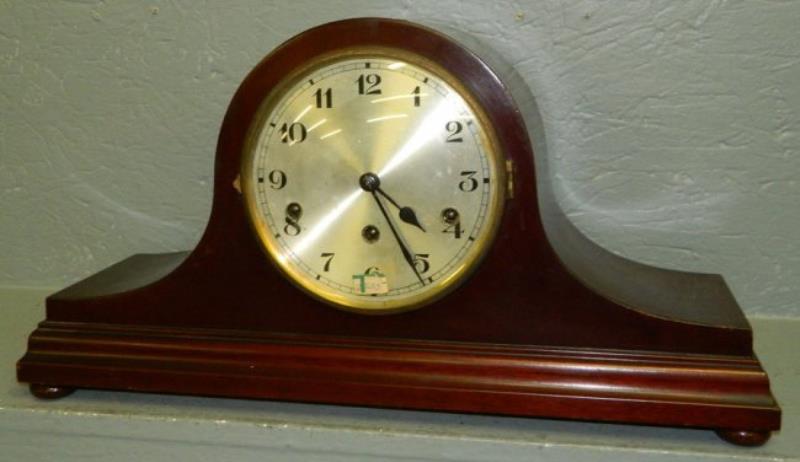 German mahogany 8 day chiming clock.