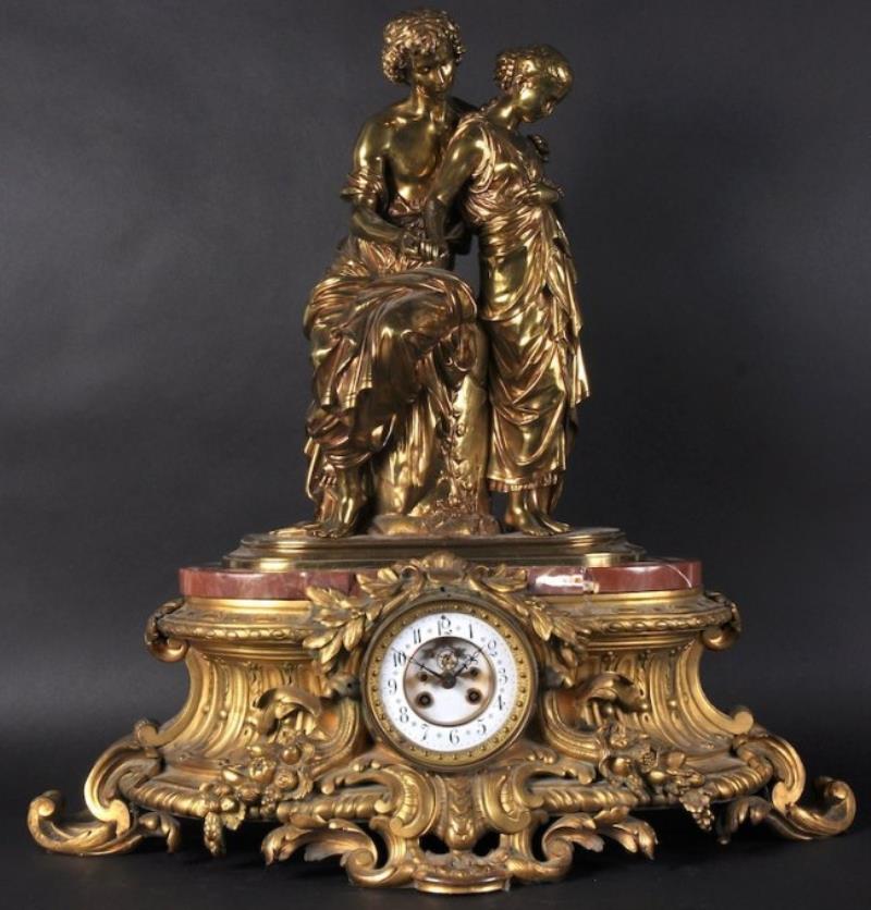 A LARGE 19TH CENTURY FRENCH ORMOLU CLOCK, with two