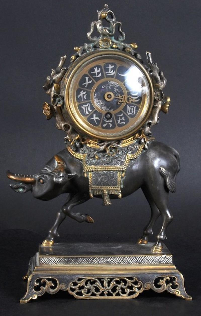 A GOOD 19TH CENTURY JAPANESE BRONZE CLOCK, formed as an