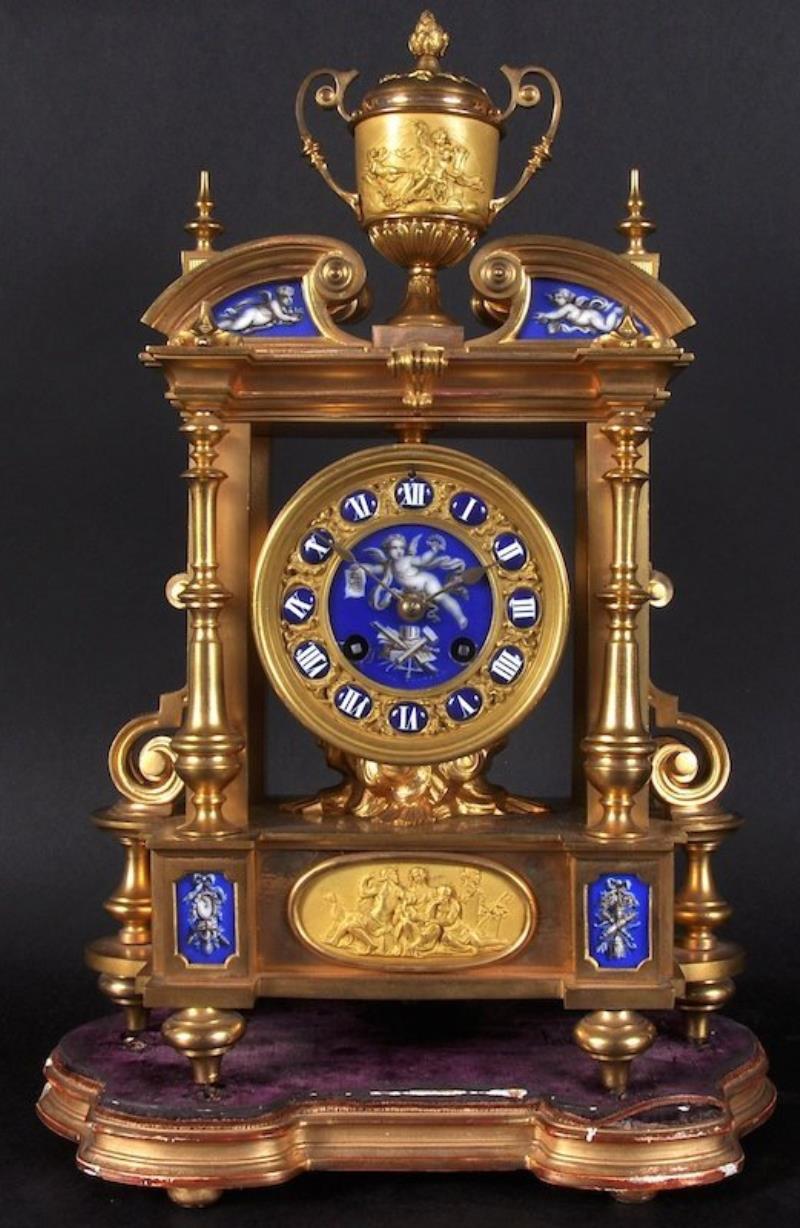 A 19TH CENTURY GILT BRONZE CLOCK, with two-handled cup