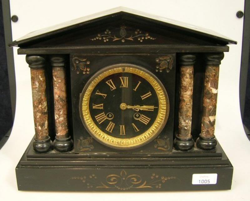 A VICTORIAN BLACK MARBLE MANTEL CLOCK