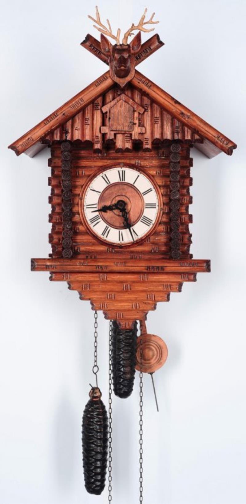 A GERMAN BLACK FOREST CUCKOO CLOCK