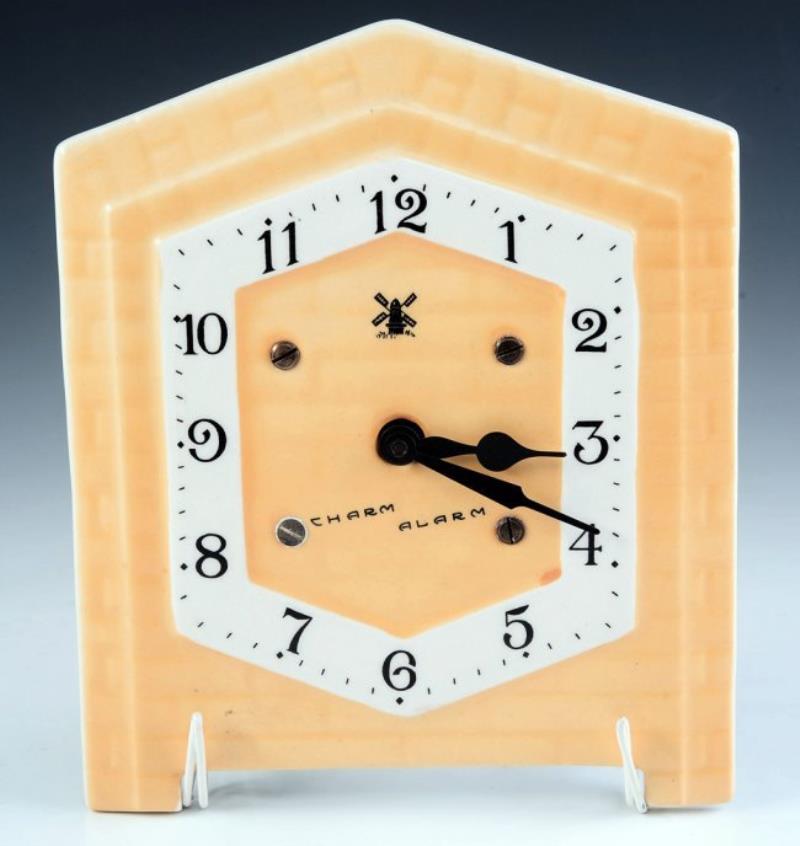 CHARM ALARM’ YELLOW ART DECO PLATE FRONT TABLE CLOCK