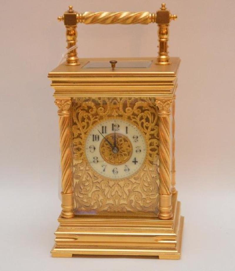 Gilt Bronze Carriage Clock with swing bar handle white