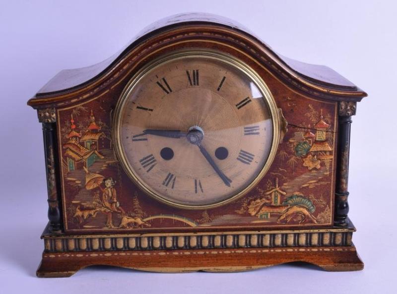 AN EARLY 20TH CENTURY EUROPEAN LACQUERED MANTEL CLOCK