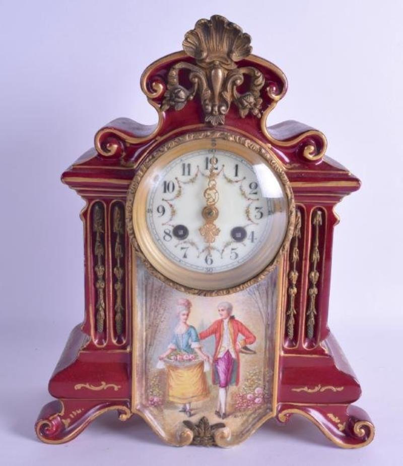 A LATE 19TH CENTURY CONTINENTAL POTTERY MANTEL CLOCK