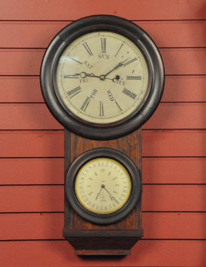 AN L.F. & W.W. CARTER DOUBLE DIAL CALENDAR CLOCK NO. 2