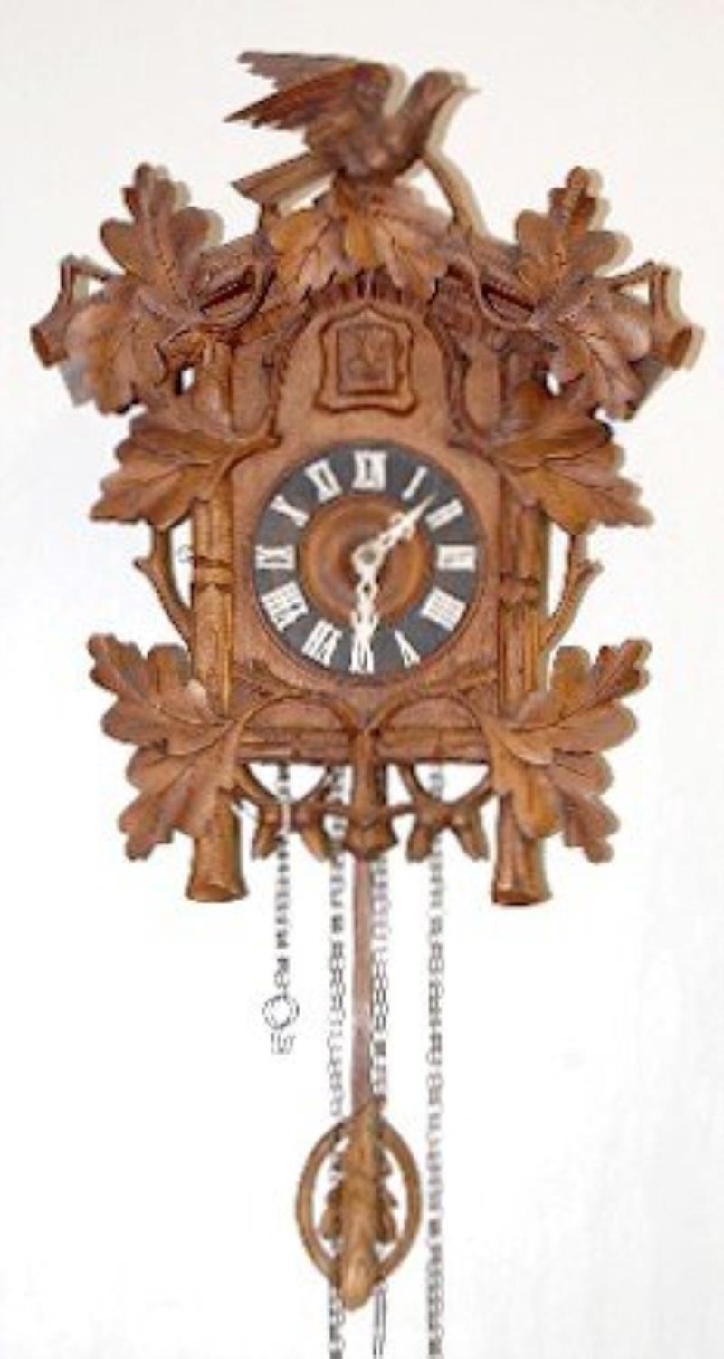 Black Forest Carved Bird Cuckoo Clock