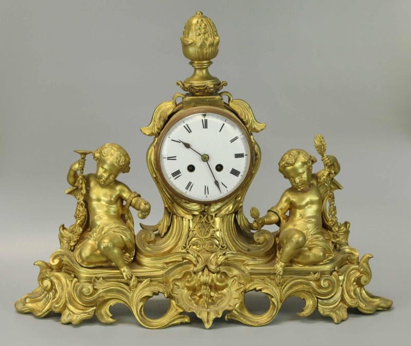 Dore bronze clock with cupids