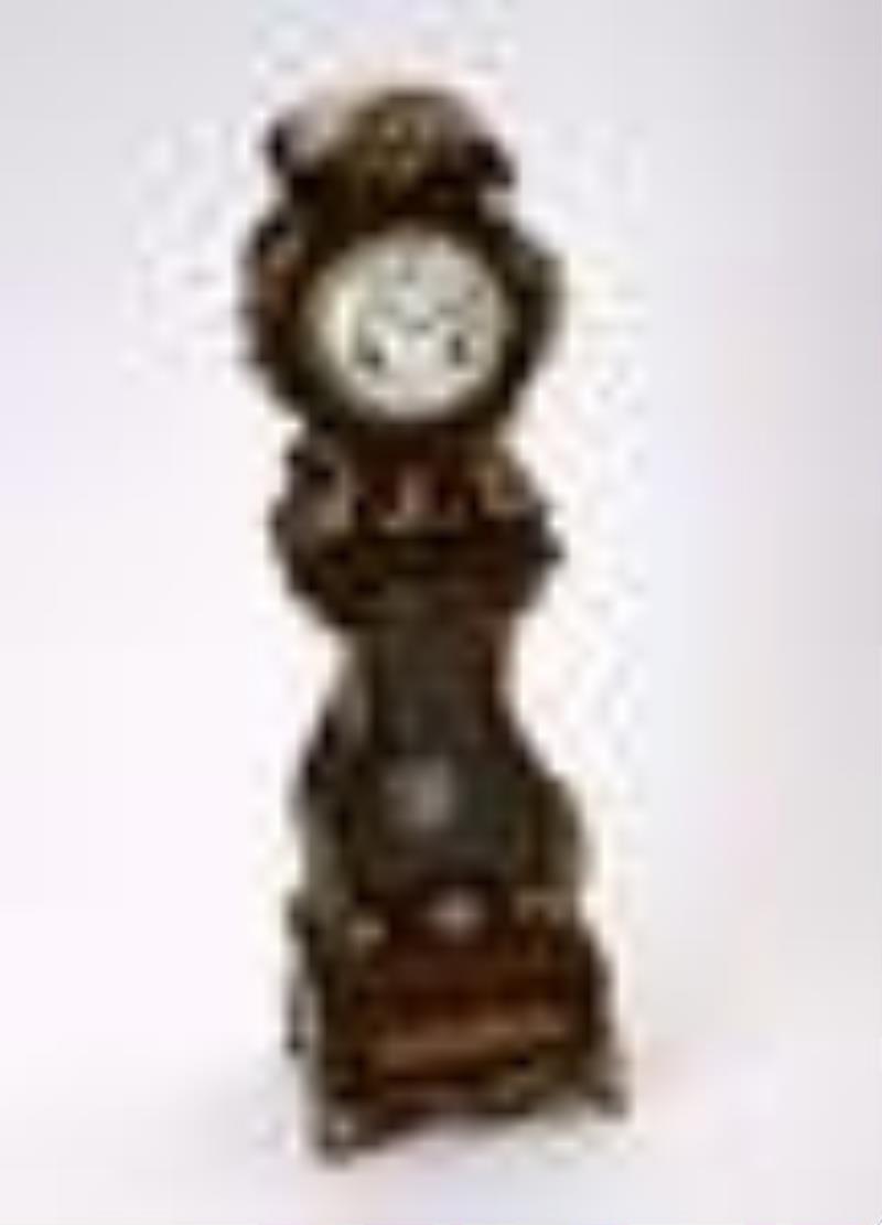 Decorative table clock in shape of a Grandfahther Clock