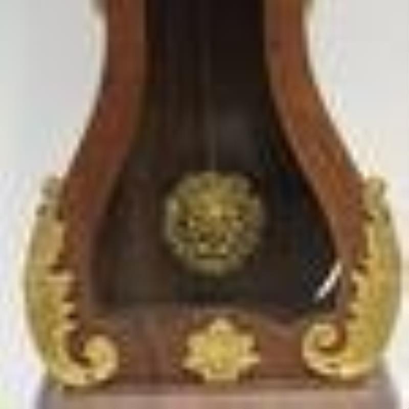 Decorative table clock in shape of a Grandfahther Clock