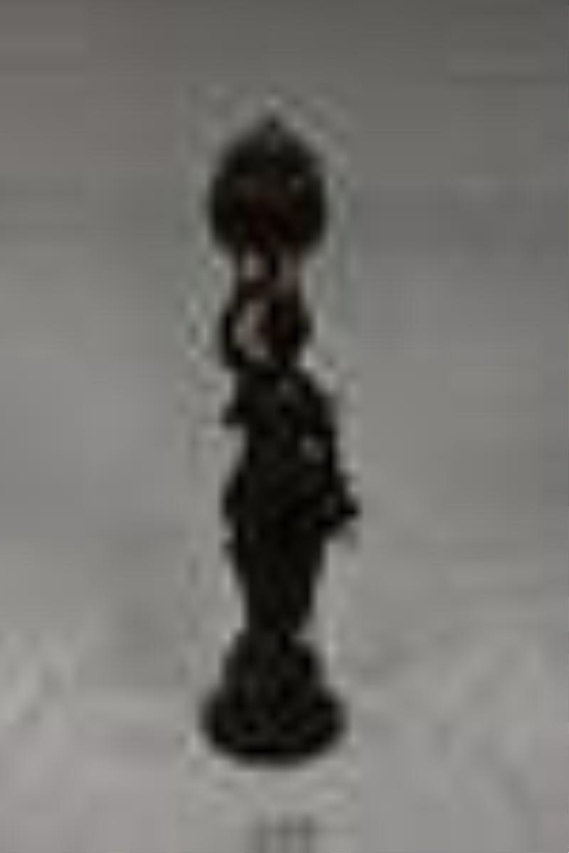 Swinging Pendulum Figural Clock