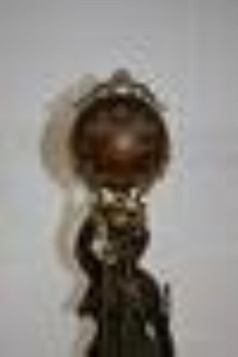 Swinging Pendulum Figural Clock