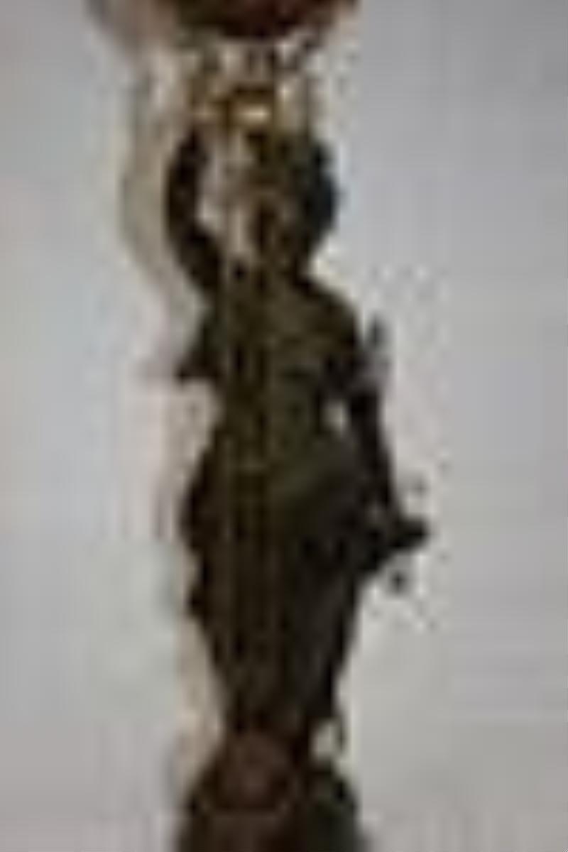 Swinging Pendulum Figural Clock