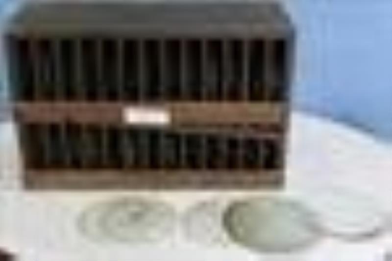 Repairman’s work box of glass clock lens, assortment