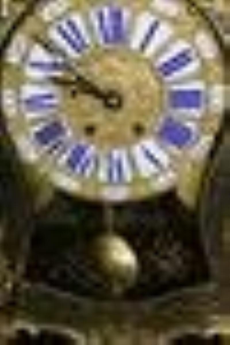 French boulle bracket clock with bronze angel