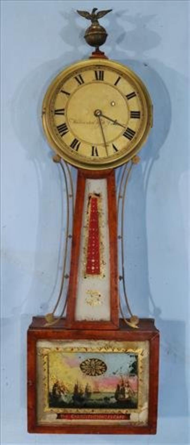 Early banjo clock with reverse painting and eagle crown