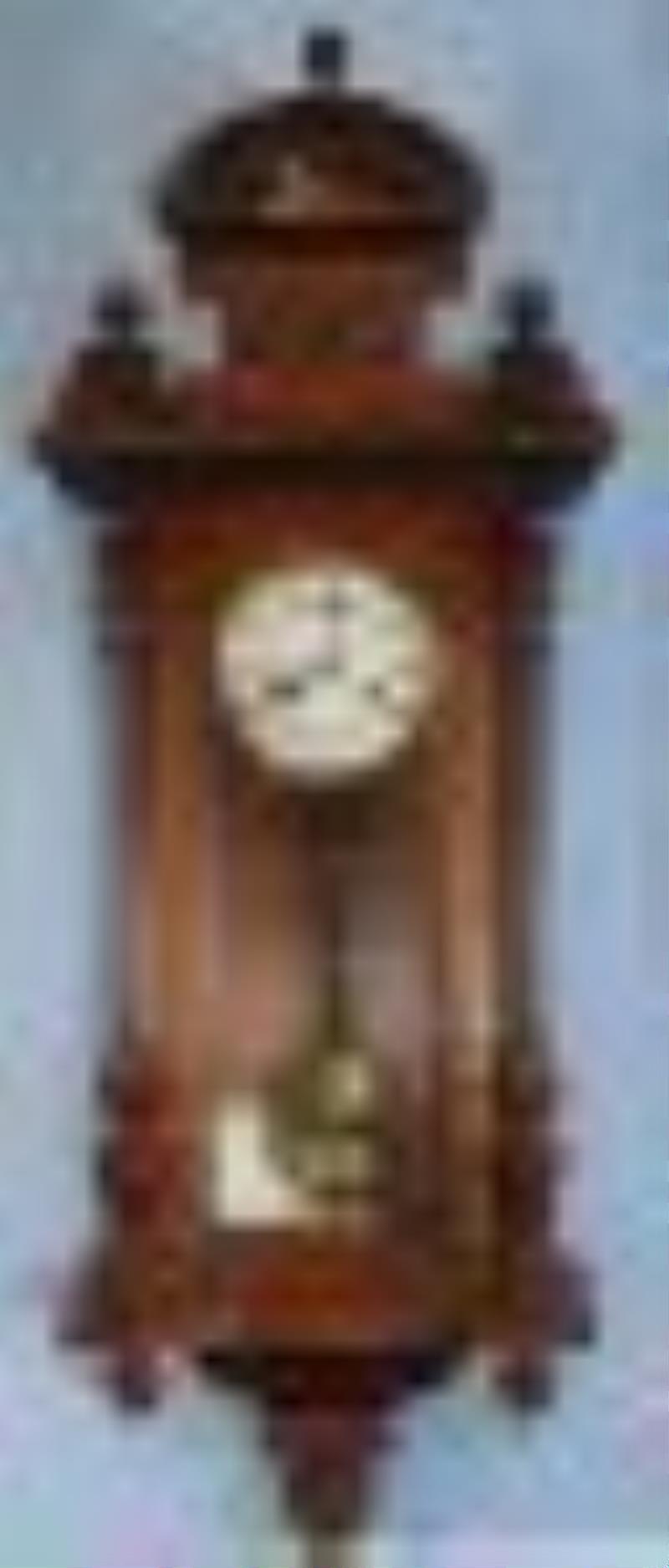 Walnut Vienna wall clock by Junghans, 38 in. T, 13 in.