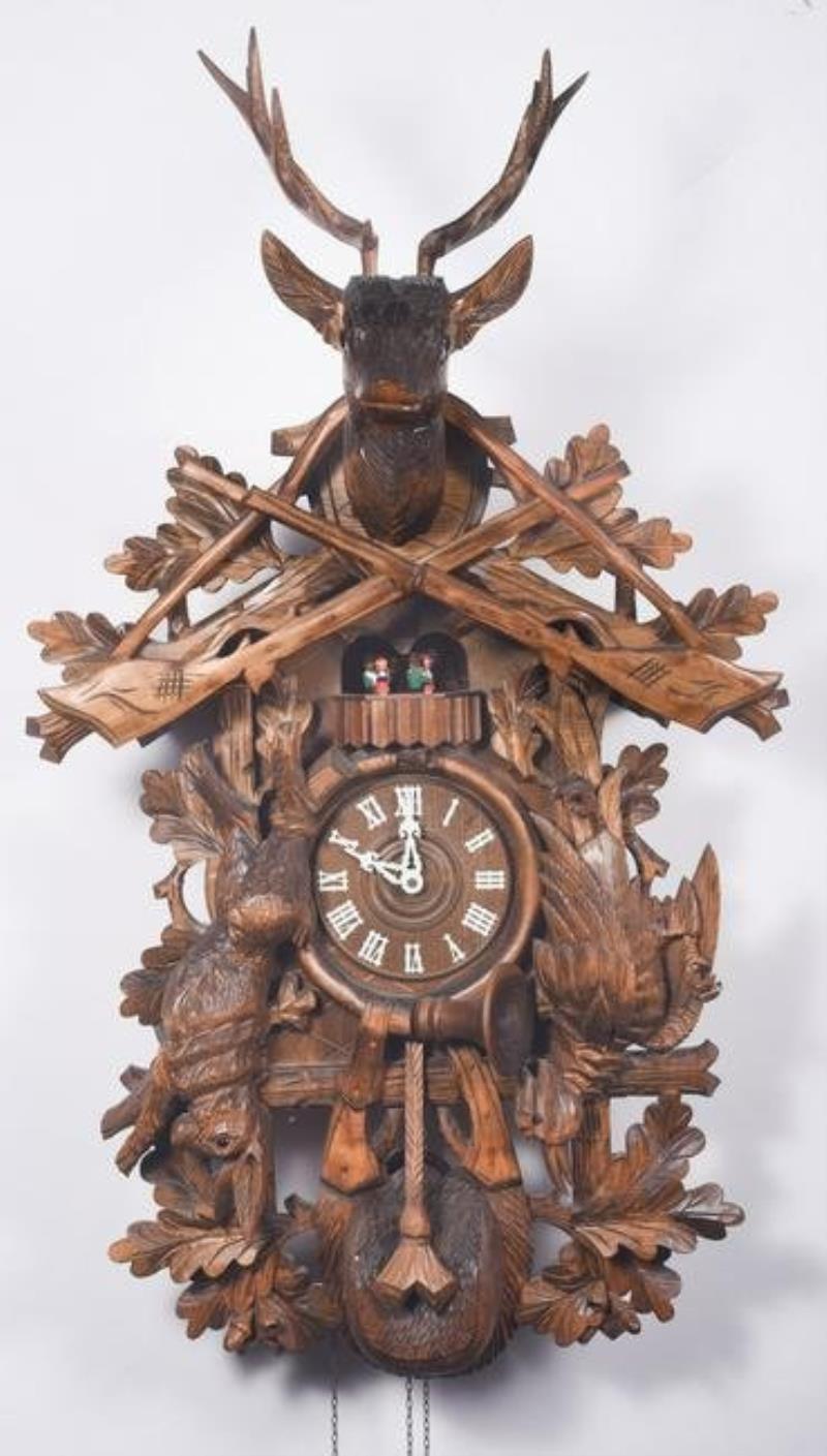 Carved walnut Black Forest Cuckoo clock