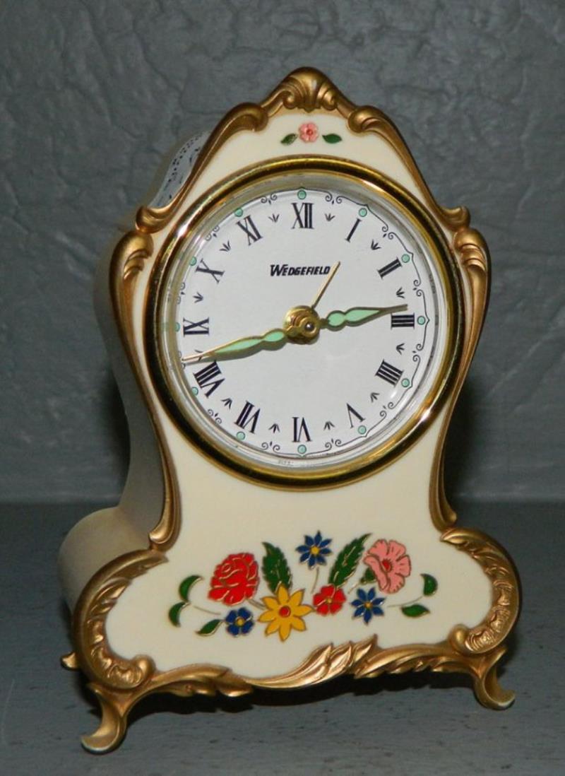 Germ. musical clock w/painted plastic case.