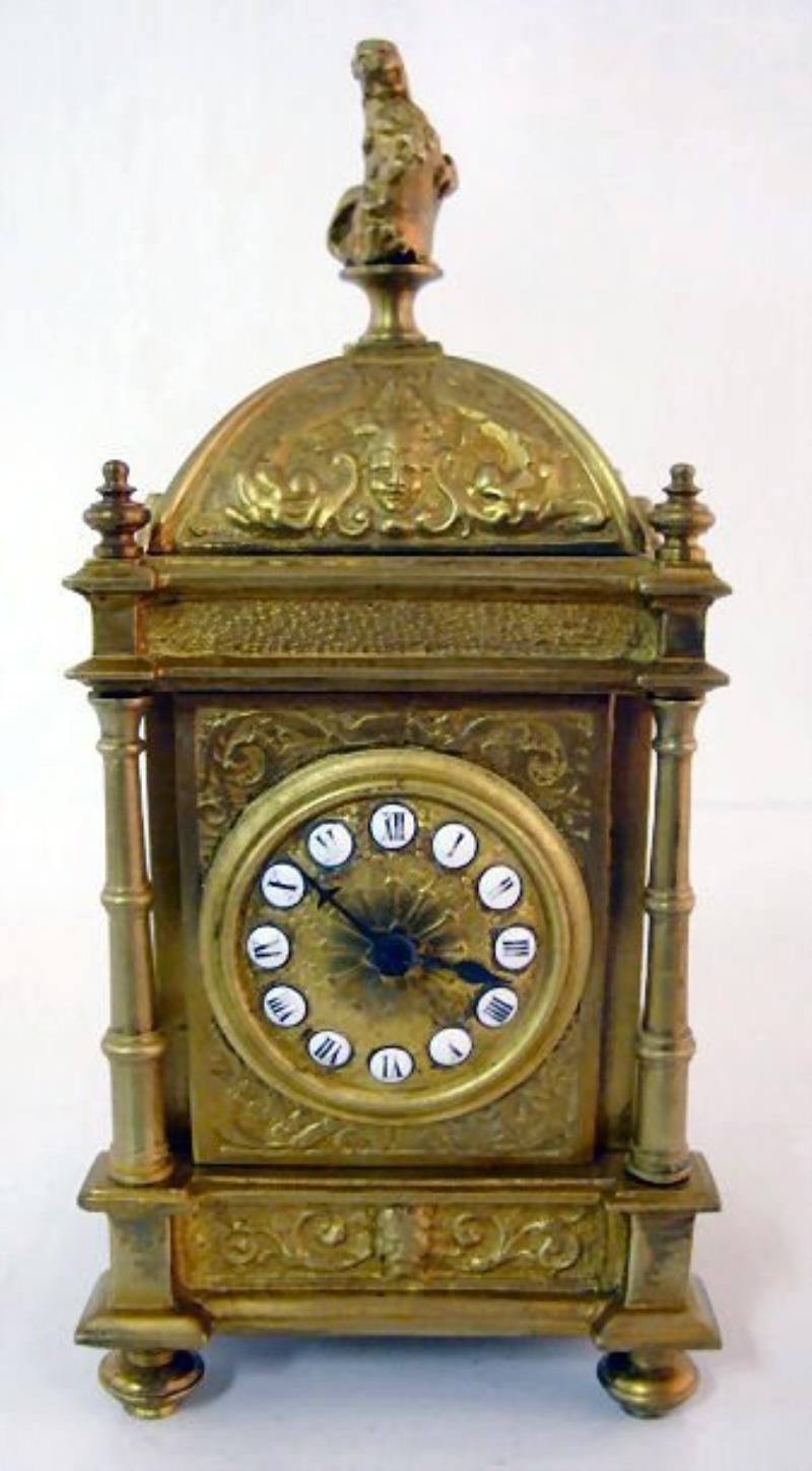 E.P. Depose Brass Time Only Clock w/Lion Finial