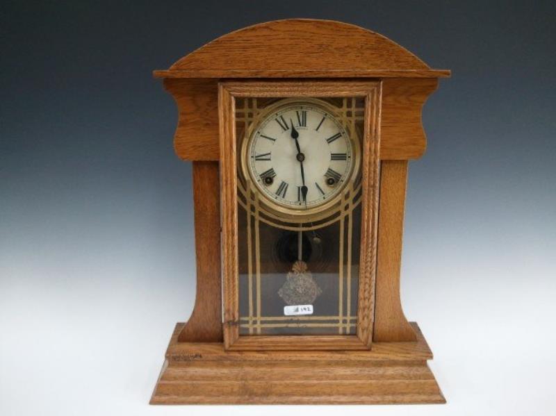 A SESSIONS ‘ASSORTMENT’ OAK KITCHEN CLOCK