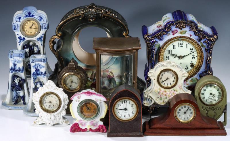 A LARGE LOT OF SMALL CLOCKS AND CLOCK CASES