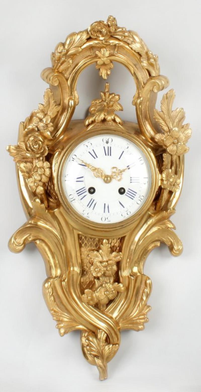 A 19th century cast gilt bronze cartel clock