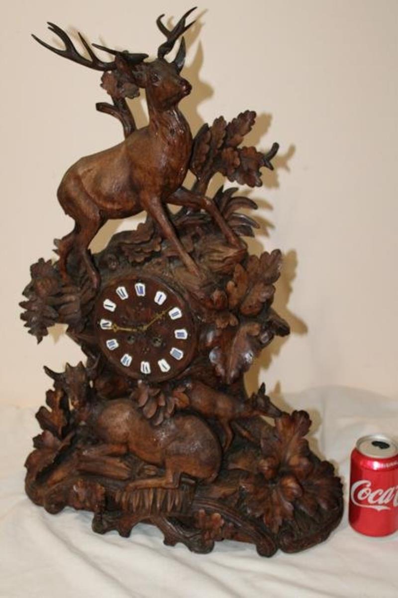 Heavily Carved Monumental Black Forrest Mantel Clock