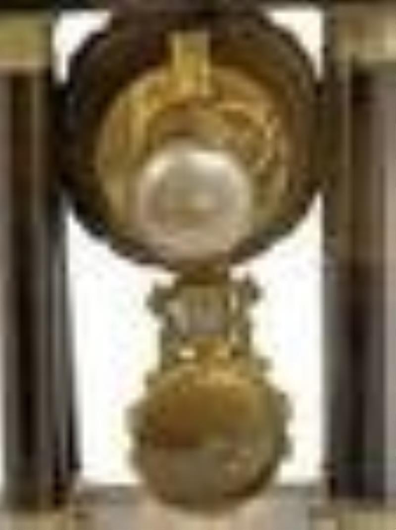A Charles X Marquetry Mantel Clock