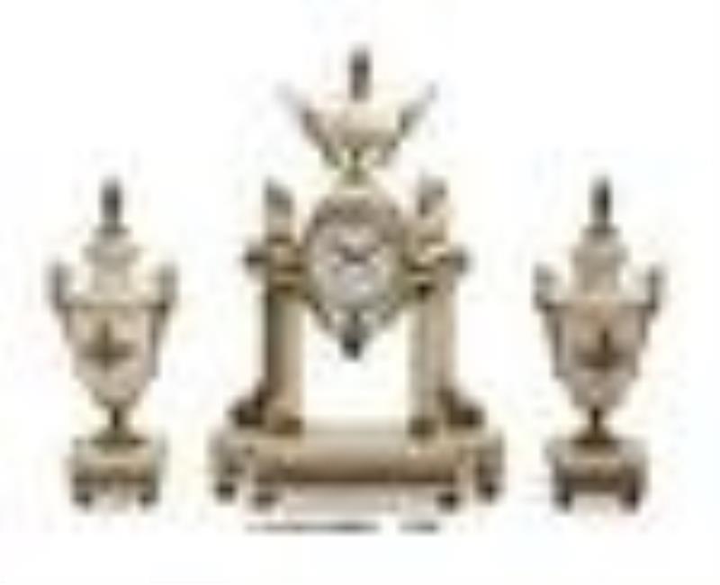A French Gilt Metal Mounted Marble Three-Piece Clock