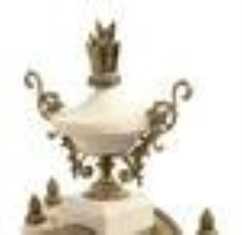 A French Gilt Metal Mounted Marble Three-Piece Clock