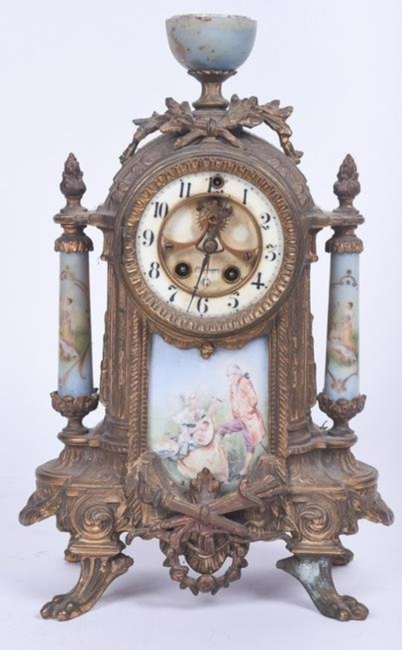 Patinated white metal French mantel clock