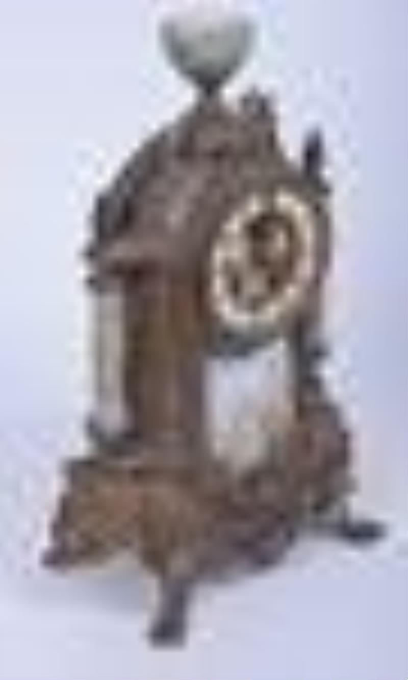 Patinated white metal French mantel clock