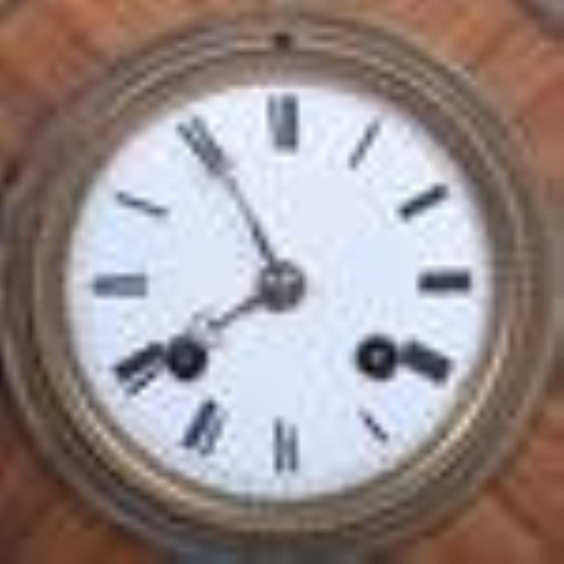 French brass & rosewood mantle clock