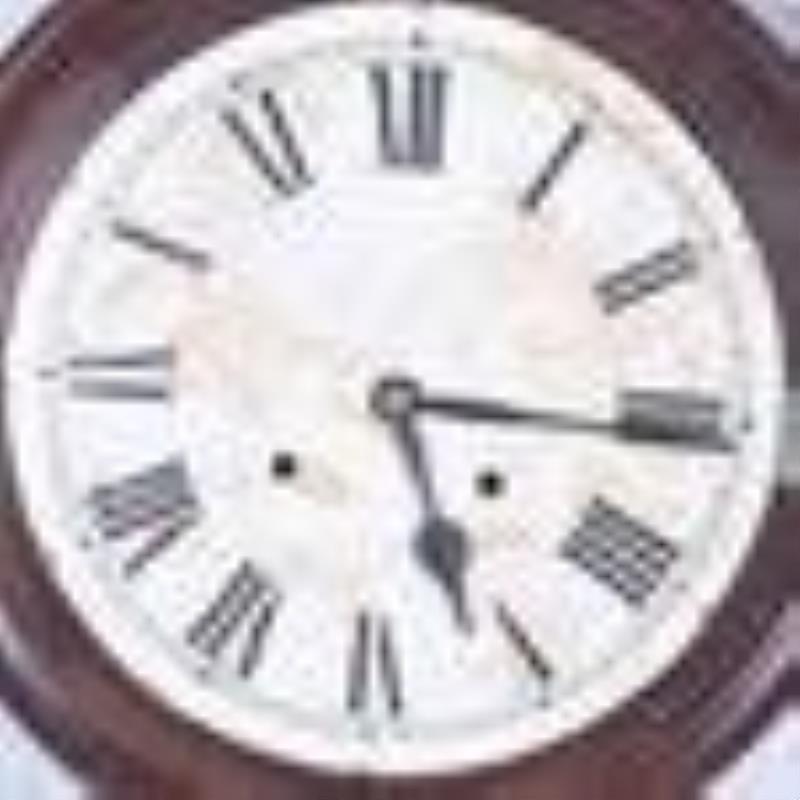 Rosewood grained gallery clock