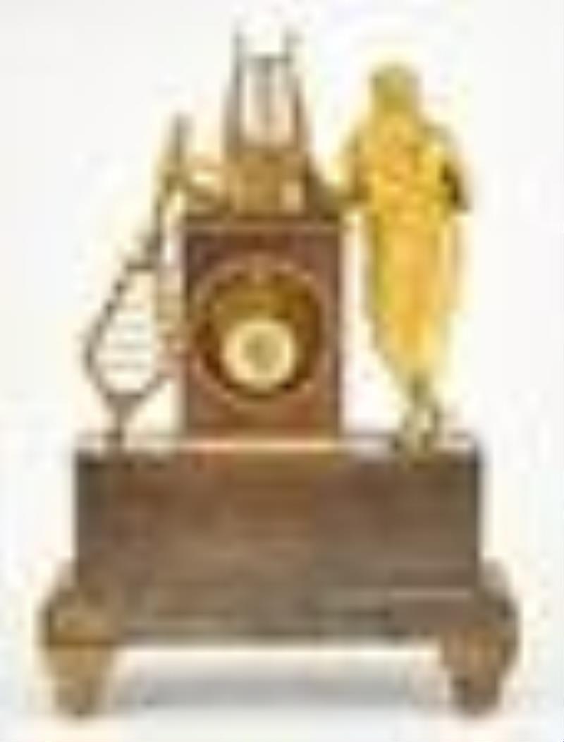 Charles X Gilt and Patinated Bronze Mantel Clock