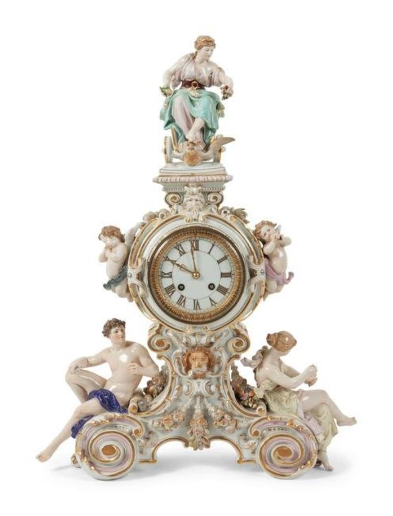 A Meissen Porcelain Figural Mantle Clock with blue