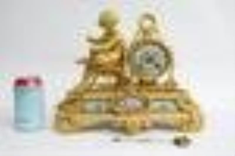 19th c. French table clock w/ Serve’s porcelain plaques
