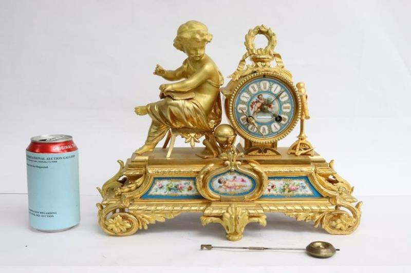 19th c. French table clock w/ Serve’s porcelain plaques