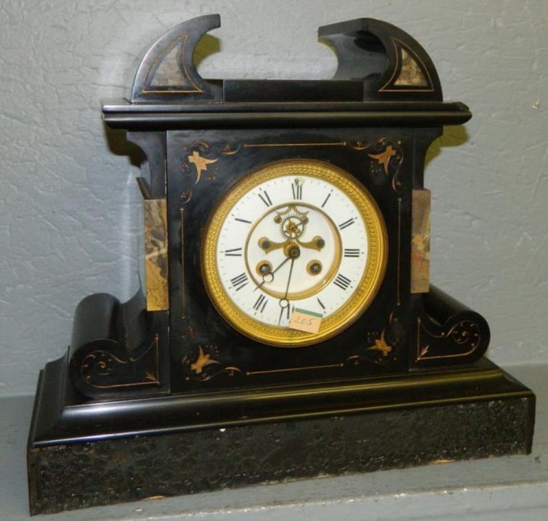 Marble 8 day mantle clock gold engraving.