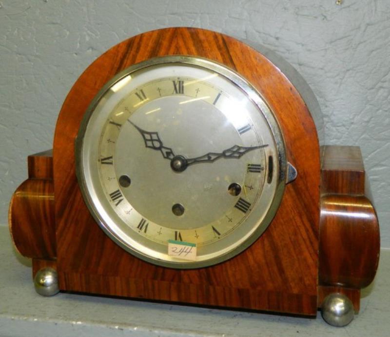 8 day modern mahogany multiple chiming clock.