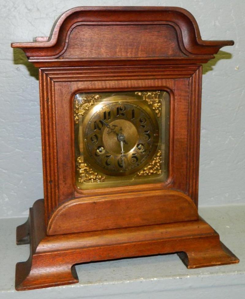 German 8 day shelf clock w/ogee feet.