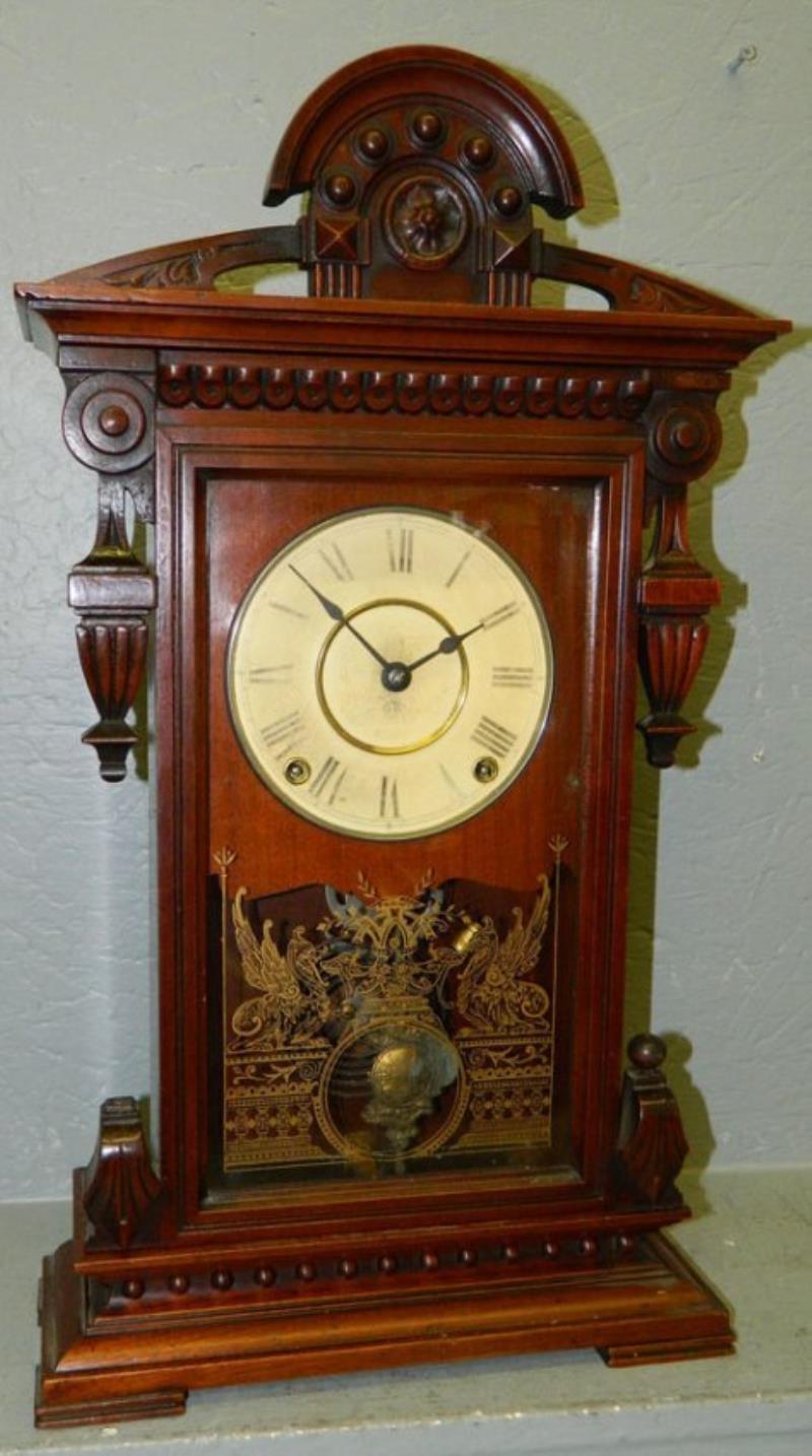 Amerr.Victorian 8 day shelf clock in walnut case.