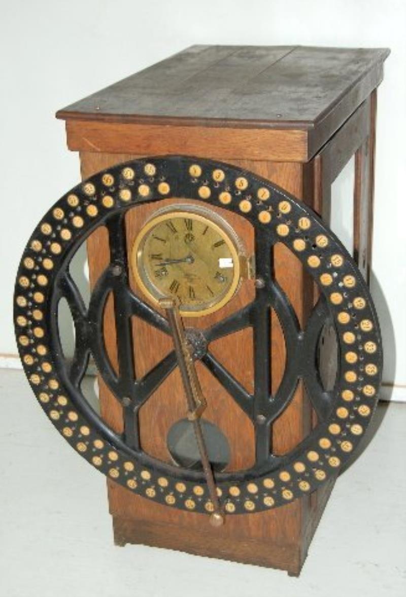 “The Day Time Register” Clock