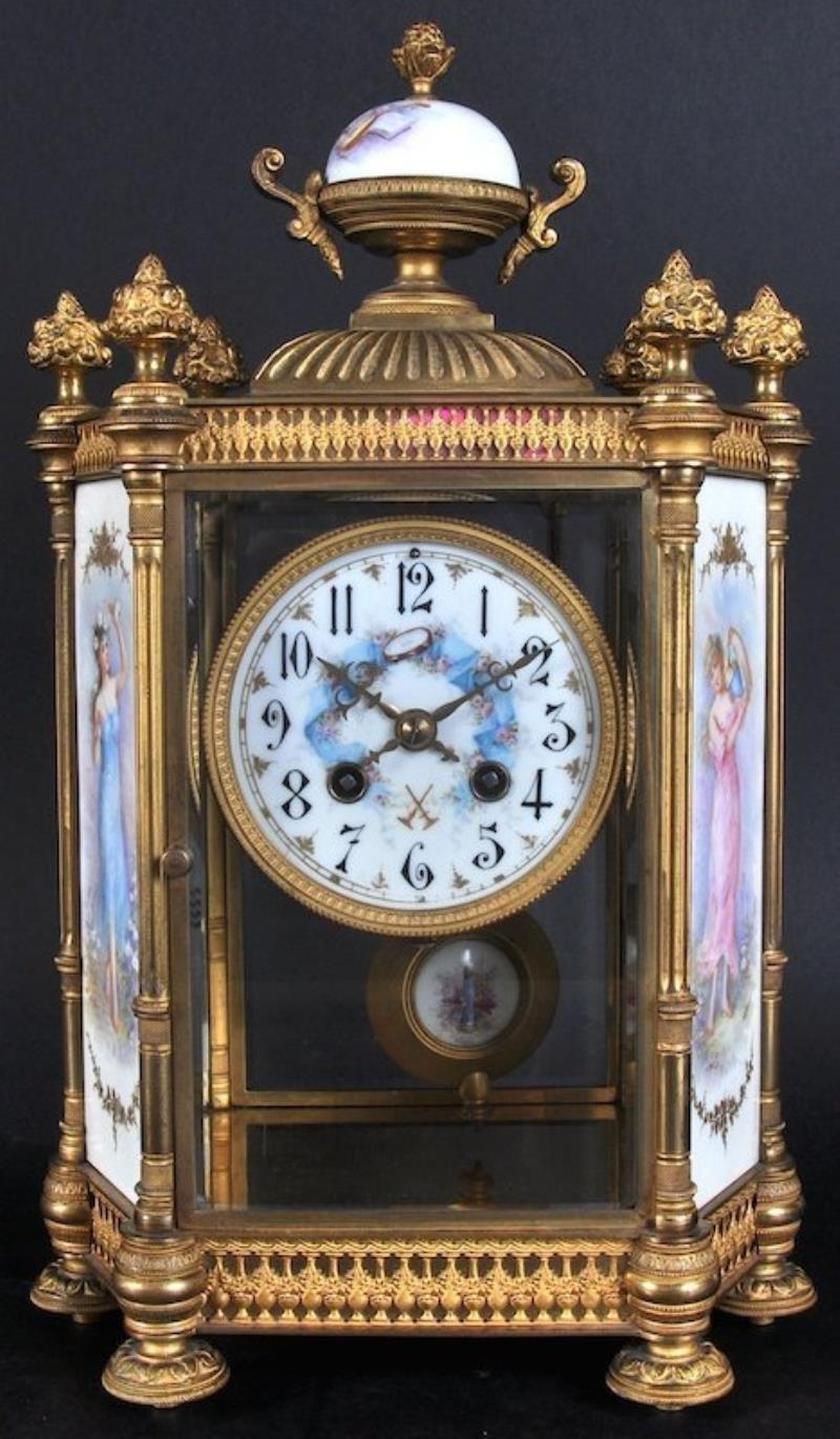 A SUPERB 19TH CENTURY FRENCH BRASS CLOCK, with urn