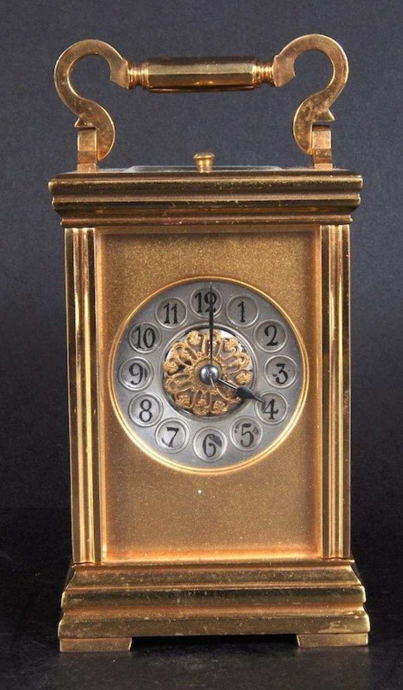 A 19TH CENTURY FRENCH BRASS CARRIAGE CLOCK, E.M. AND